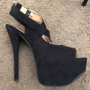 Black open toe stilettos.